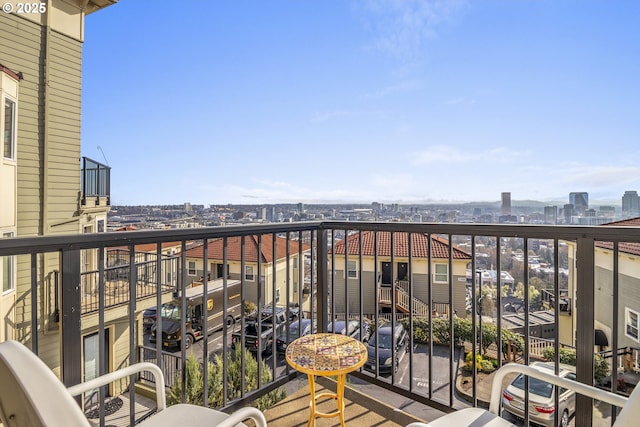 balcony featuring a city view