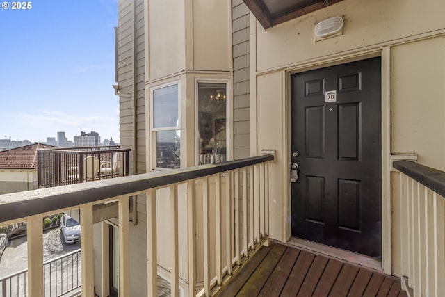 doorway to property featuring a balcony