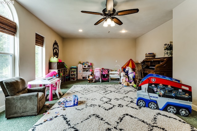 game room featuring ceiling fan and carpet flooring