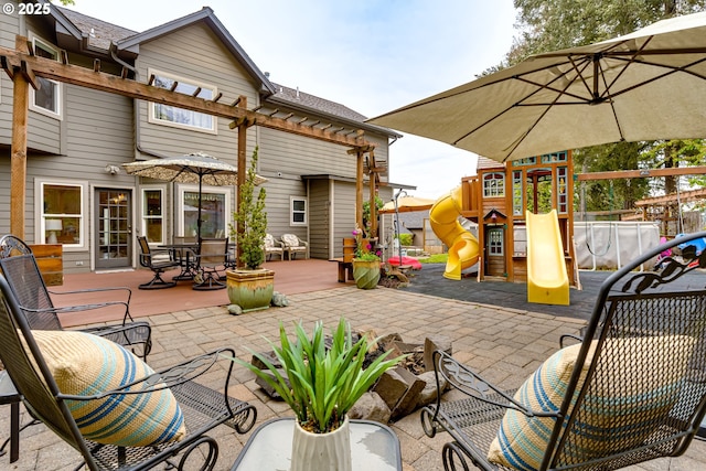 view of patio featuring a playground