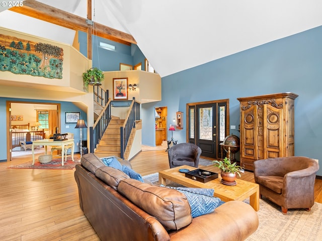 33901 Merrill Creek Rd, Deer Island, OR 97054 - living area with high vaulted ceiling, stairs, and light wood-type flooring