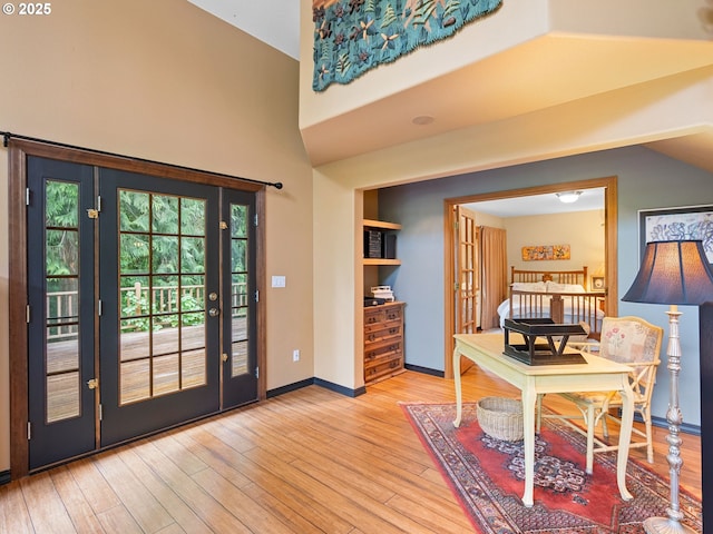 33901 Merrill Creek Rd, Deer Island, OR 97054 - home office with wood-type flooring, baseboards, and high vaulted ceiling