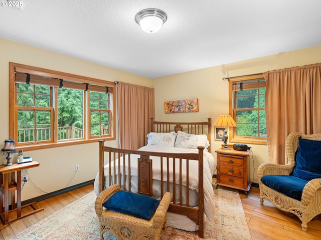33901 Merrill Creek Rd, Deer Island, OR 97054 - bedroom featuring light wood finished floors