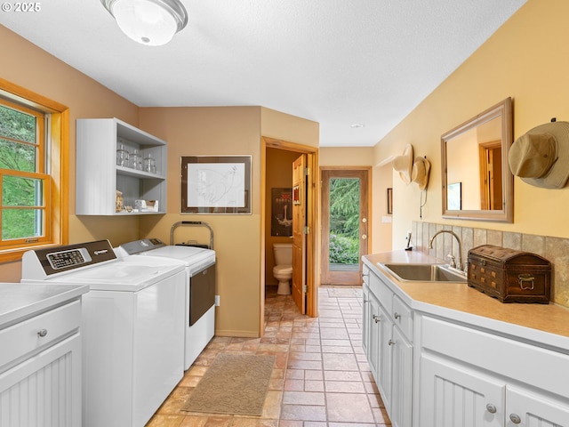 33901 Merrill Creek Rd, Deer Island, OR 97054 - washroom featuring cabinet space and washing machine and clothes dryer