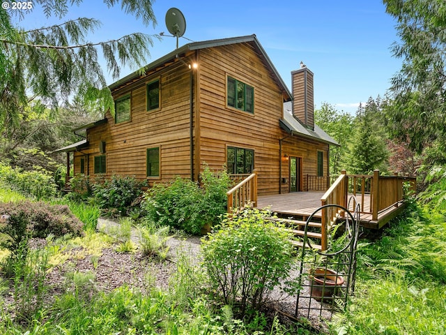 33901 Merrill Creek Rd, Deer Island, OR 97054 - rear view of property featuring a chimney and a wooden deck