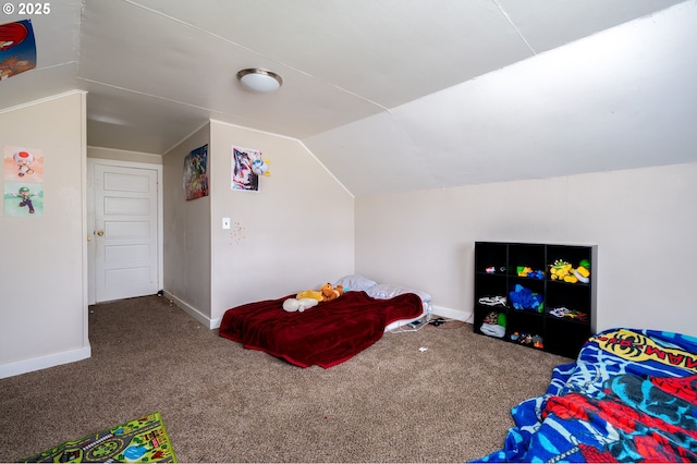 carpeted bedroom with vaulted ceiling