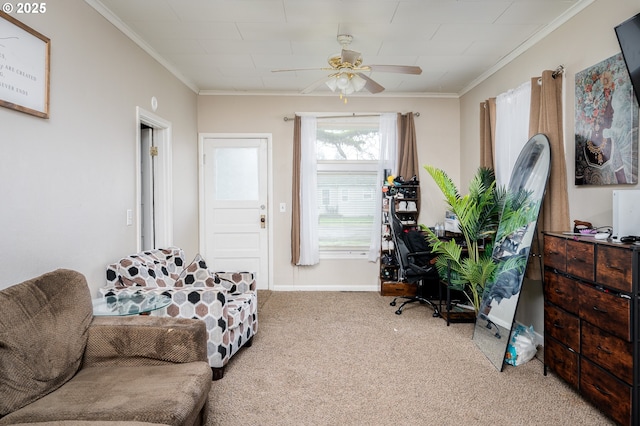 sitting room featuring crown molding, ceiling fan, and carpet