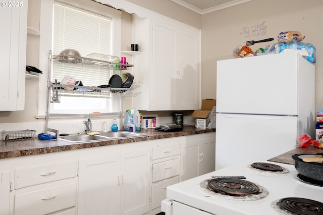 kitchen featuring white cabinetry, sink, white appliances, and ornamental molding