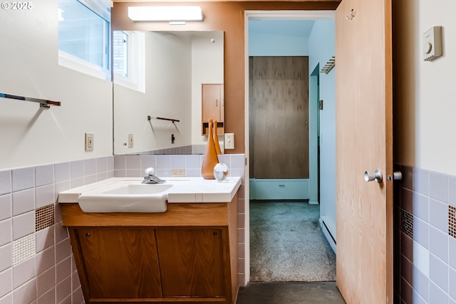 495 W 27th Ave, Eugene, OR 97405 - bathroom featuring tile walls, vanity, and a wainscoted wall