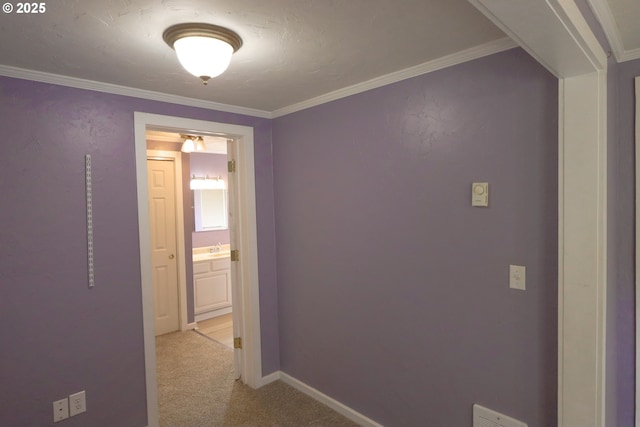 58798 Fairview Rd, Coquille, OR 97423 - hall featuring light colored carpet, baseboards, ornamental molding, and a sink