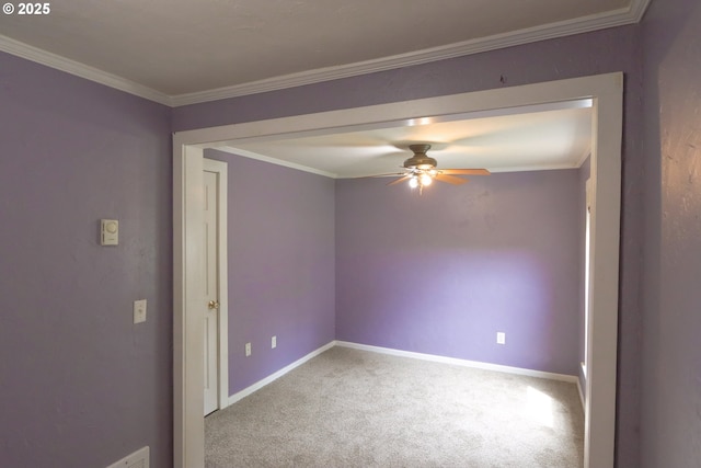 58798 Fairview Rd, Coquille, OR 97423 - empty room with a ceiling fan, carpet floors, baseboards, and crown molding