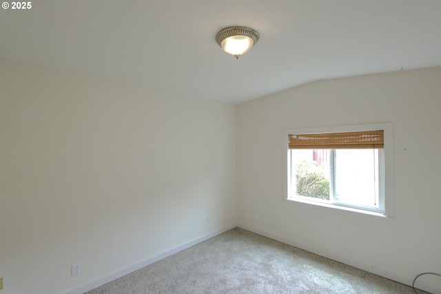 58798 Fairview Rd, Coquille, OR 97423 - unfurnished room with light colored carpet, baseboards, and lofted ceiling