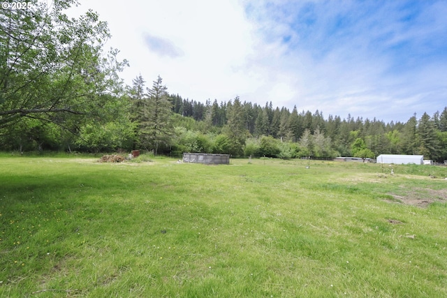 58798 Fairview Rd, Coquille, OR 97423 - view of green lawn with a forest view and a rural view