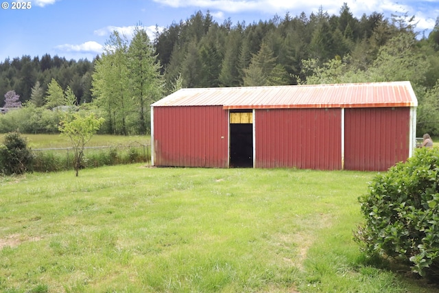 58798 Fairview Rd, Coquille, OR 97423 - view of pole building featuring a yard and a view of trees
