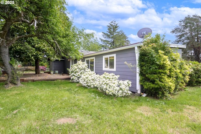 58798 Fairview Rd, Coquille, OR 97423 - rear view of house with a deck and a lawn