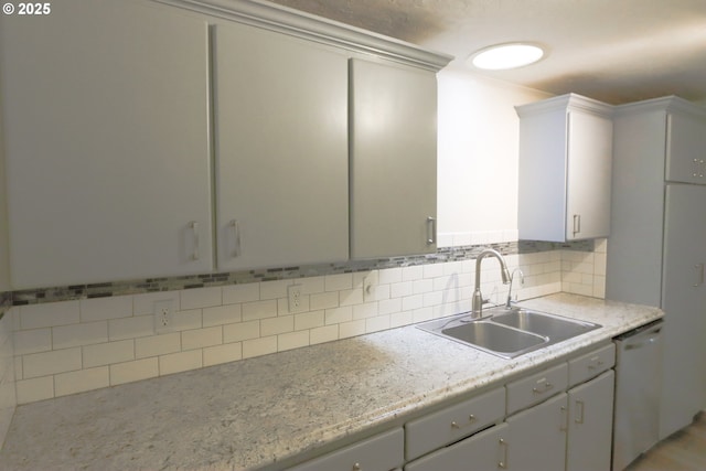 58798 Fairview Rd, Coquille, OR 97423 - kitchen with a sink, white dishwasher, light countertops, and decorative backsplash