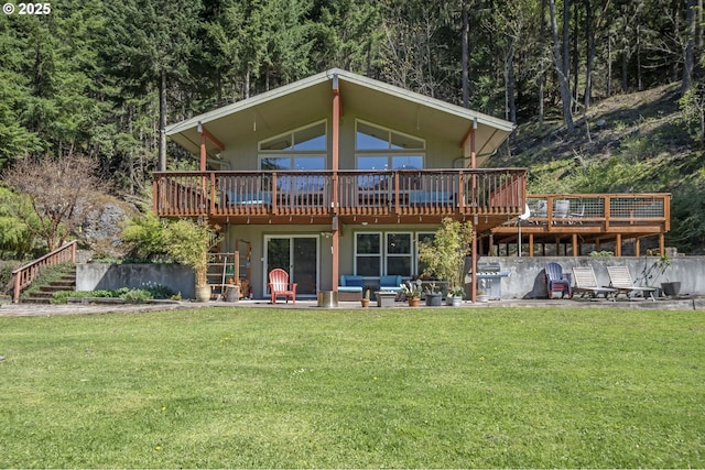 49867 Hills Creek Rd, Oakridge, OR 97463 - rear view of property featuring a patio, a wooden deck, and a lawn