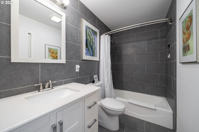 49867 Hills Creek Rd, Oakridge, OR 97463 - full bathroom featuring tile walls, vanity, shower / bath combo with shower curtain, toilet, and tile patterned flooring