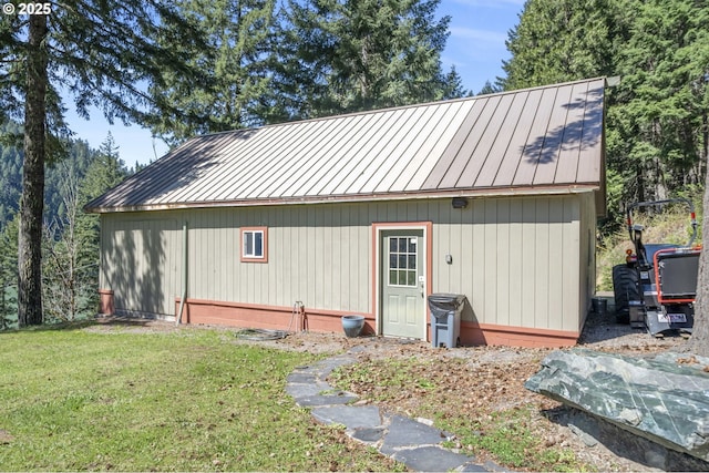 49867 Hills Creek Rd, Oakridge, OR 97463 - rear view of property featuring metal roof, a standing seam roof, and a lawn