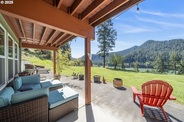 49867 Hills Creek Rd, Oakridge, OR 97463 - view of patio / terrace featuring a mountain view and an outdoor living space