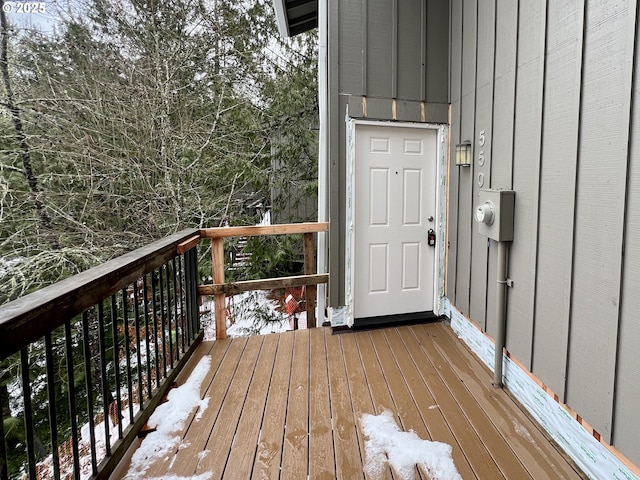 view of snow covered deck