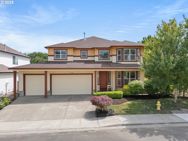 12988 NW Tigon Ln, Portland, OR 97229 - view of front facade featuring driveway, roof with shingles, and a garage