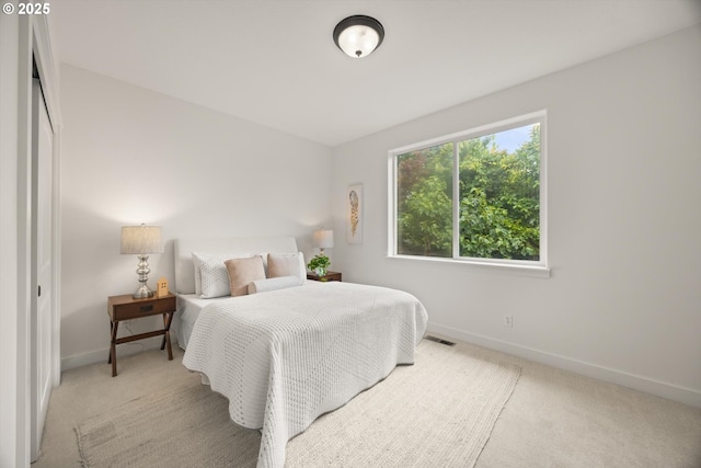 12988 NW Tigon Ln, Portland, OR 97229 - carpeted bedroom featuring baseboards