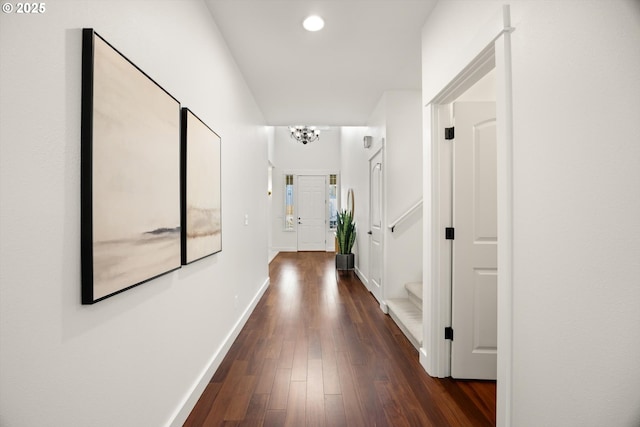 12988 NW Tigon Ln, Portland, OR 97229 - corridor featuring a chandelier, dark wood-style floors, recessed lighting, and stairway