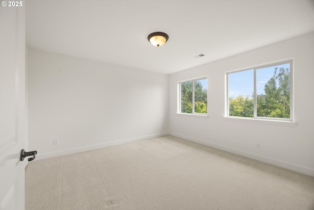12988 NW Tigon Ln, Portland, OR 97229 - spare room featuring baseboards and light carpet