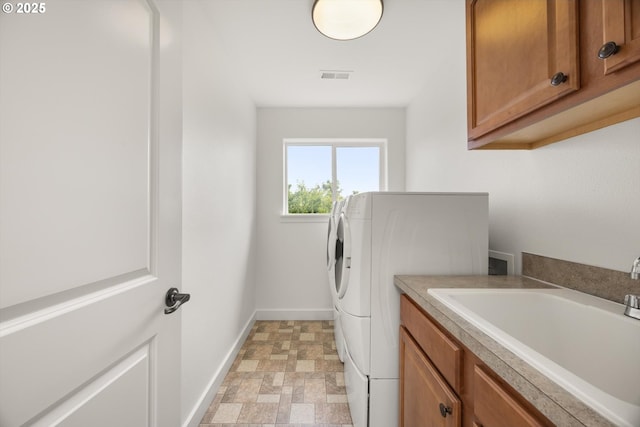 12988 NW Tigon Ln, Portland, OR 97229 - washroom with cabinet space and washing machine and dryer