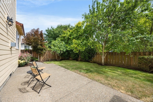 12988 NW Tigon Ln, Portland, OR 97229 - fenced backyard featuring a patio area