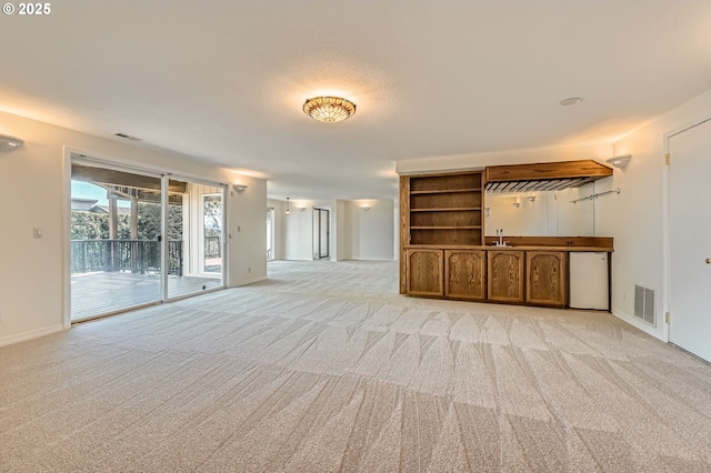 15911 NE 29th Ave, Ridgefield, WA 98642 - unfurnished living room featuring light carpet and baseboards