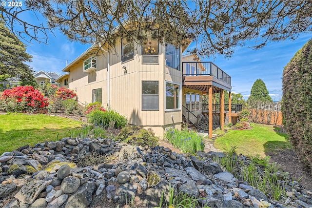 15911 NE 29th Ave, Ridgefield, WA 98642 - view of property exterior featuring a deck and a lawn