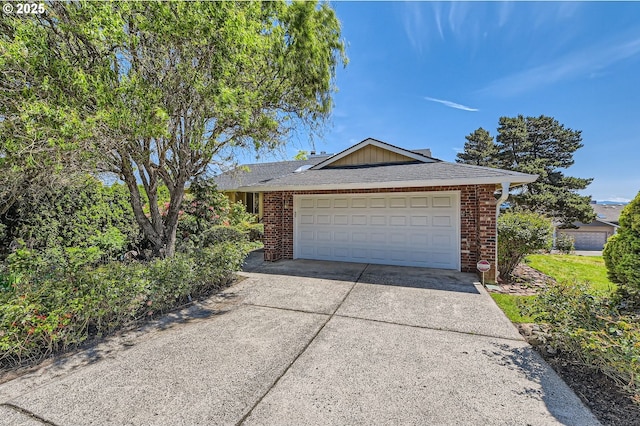 15911 NE 29th Ave, Ridgefield, WA 98642 - single story home featuring driveway, brick siding, and an attached garage