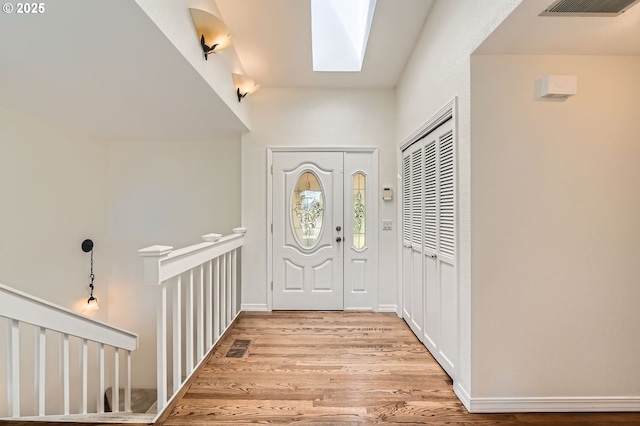 15911 NE 29th Ave, Ridgefield, WA 98642 - foyer featuring light wood-style flooring and a skylight