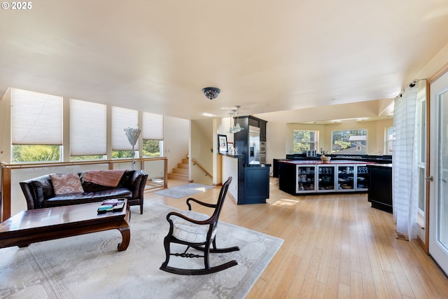 34700 Hill St, Pacific City, OR 97135 - living area with healthy amount of natural light, light wood-style floors, and stairway