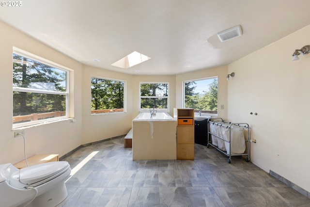 34700 Hill St, Pacific City, OR 97135 - sunroom / solarium featuring a skylight