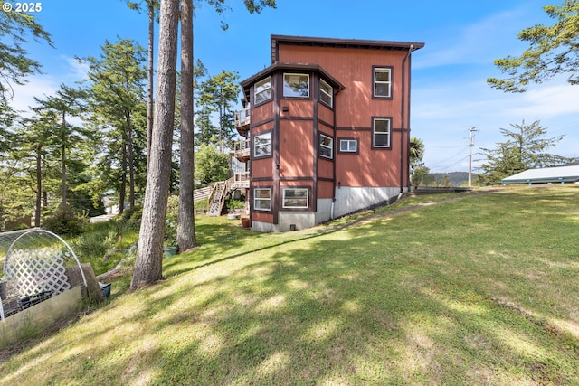 34700 Hill St, Pacific City, OR 97135 - back of property featuring stairs and a lawn