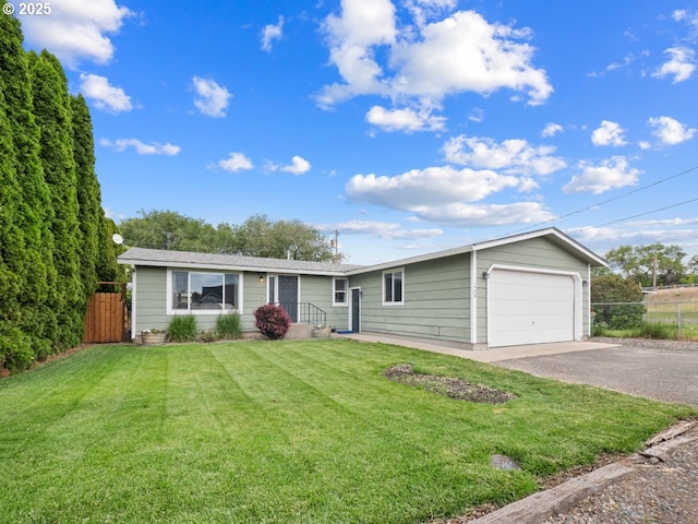 1408 25th St, La Grande, OR 97850 - ranch-style house with an attached garage and asphalt driveway
