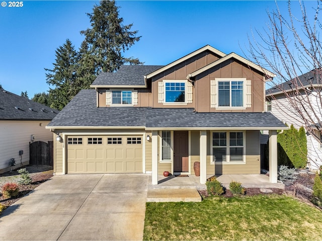 view of front of home with a shingled roof, concrete driveway, board and batten siding, a gate, and fence