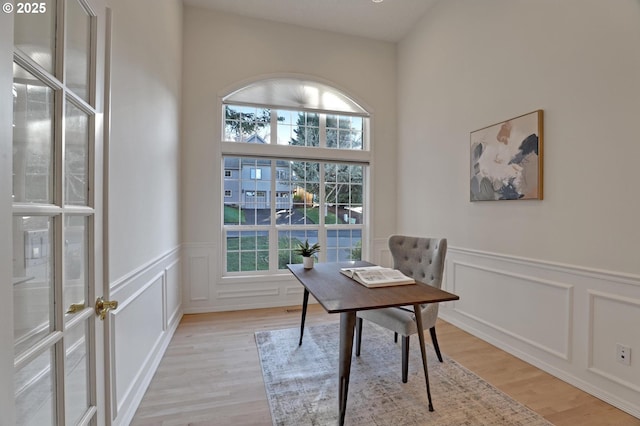 office with light hardwood / wood-style floors