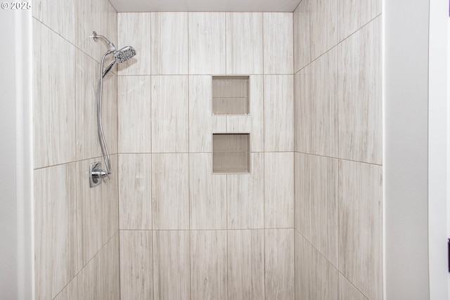details with a tile shower