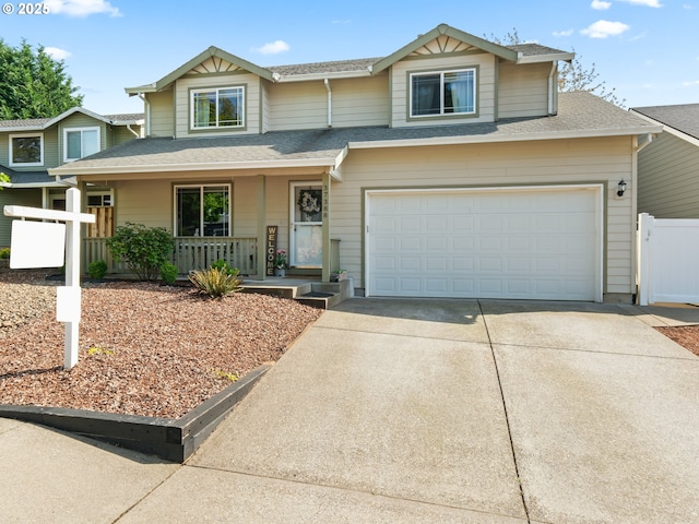 37388 SE Olson St, Sandy, OR 97055 - view of front of house featuring covered porch, concrete driveway, an attached garage, and a shingled roof