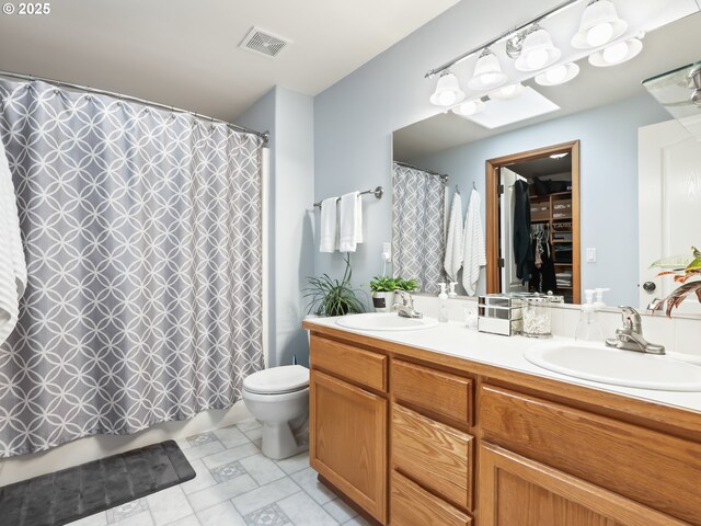 37388 SE Olson St, Sandy, OR 97055 - full bathroom featuring toilet, double vanity, and shower / bath combination with curtain