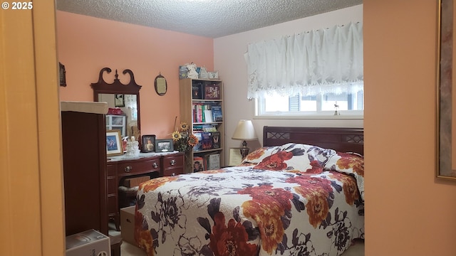 bedroom featuring a textured ceiling