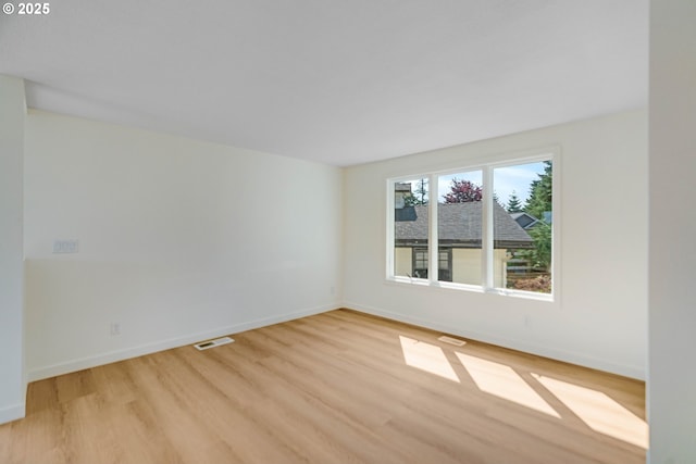 6195 Pear Tree Ln SE, Salem, OR 97317 - spare room with light wood-style flooring and baseboards