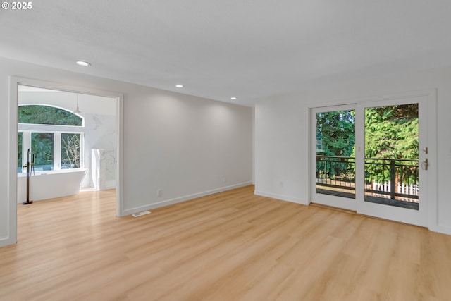 6195 Pear Tree Ln SE, Salem, OR 97317 - empty room with light wood-type flooring and recessed lighting