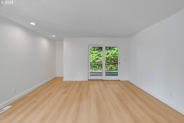 6195 Pear Tree Ln SE, Salem, OR 97317 - spare room featuring light wood-type flooring and recessed lighting