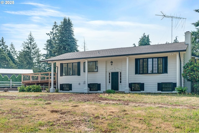 6195 Pear Tree Ln SE, Salem, OR 97317 - split foyer home featuring a chimney, a front lawn, and a deck