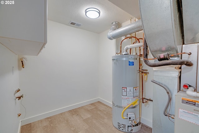 6195 Pear Tree Ln SE, Salem, OR 97317 - utilities with strapped water heater